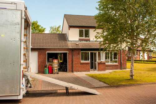 Moving Truck in Front of House